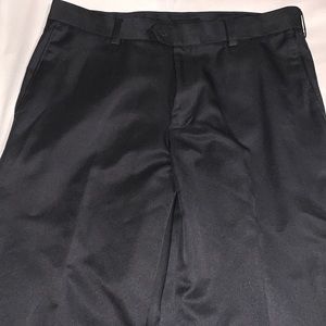Black IZOD golf dress pants, size 34x30.